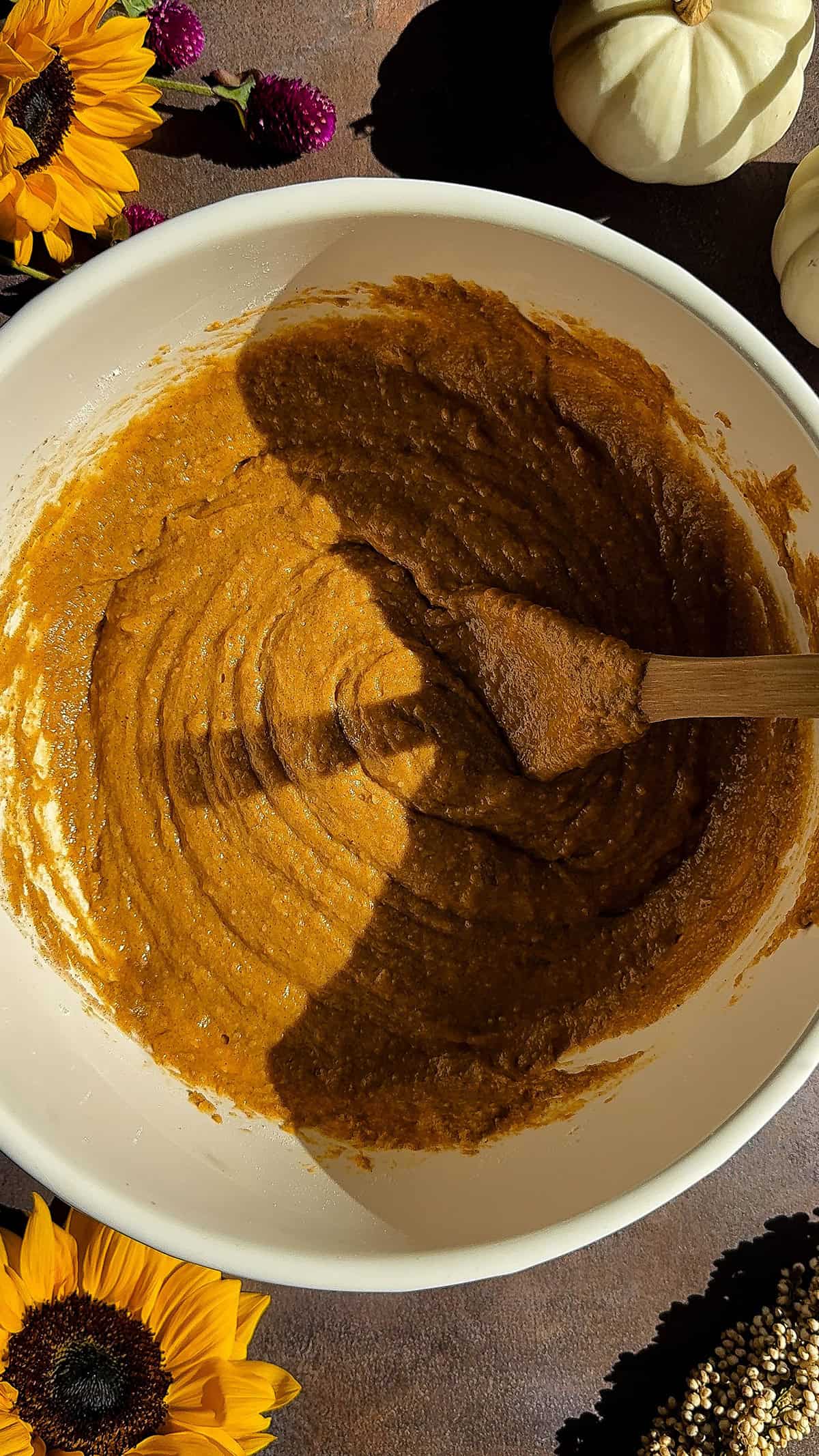 mixing batter for pumpkin cake