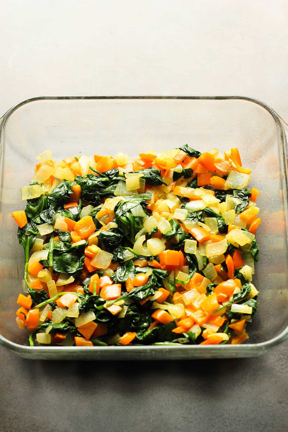 cooked vegetables ready for eggs and baking