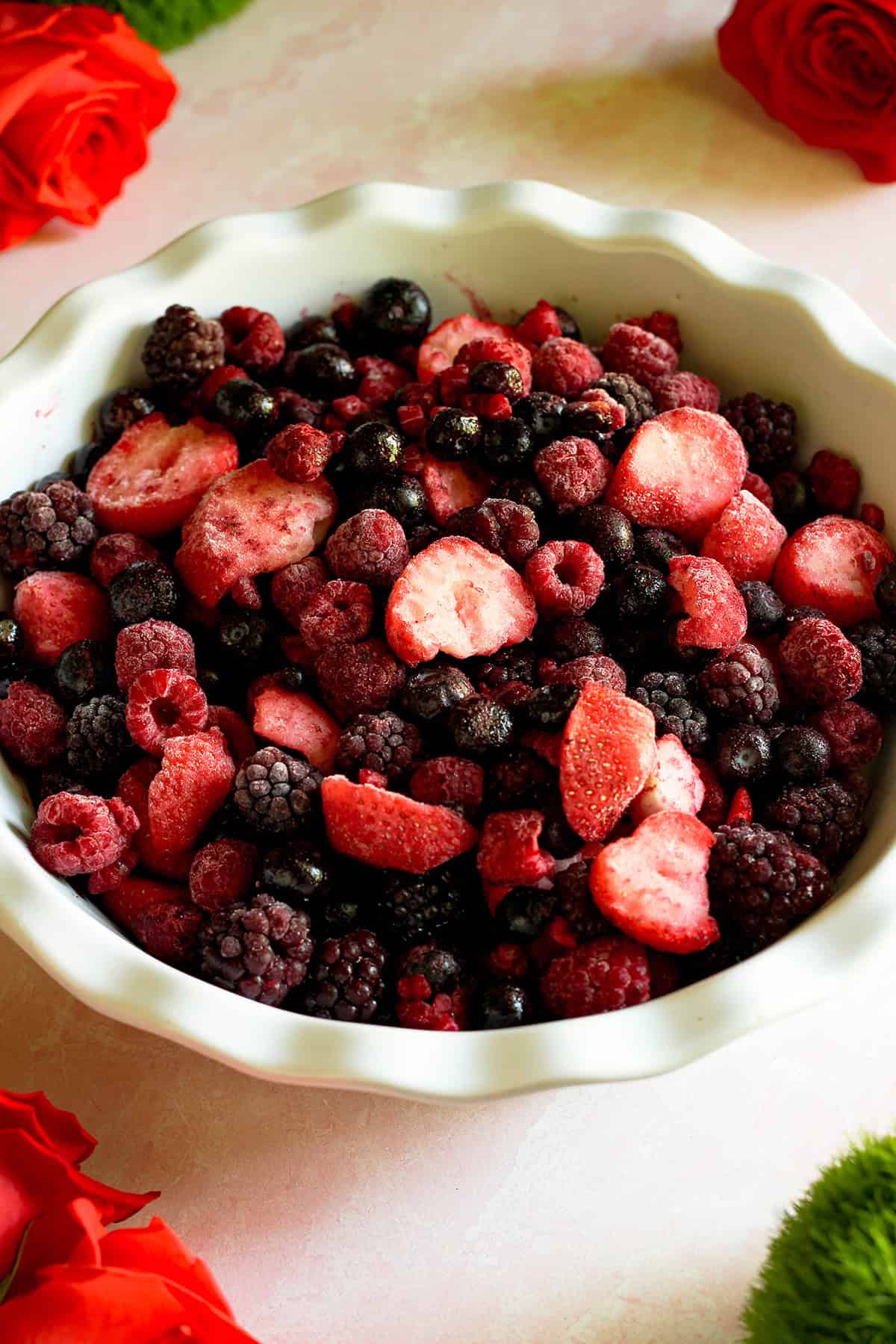 mixed berries added to baking dish